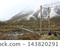 Landscape with a suspension bridge, Mount Cook, New Zealand 143820291