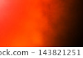 Vibrant red orange light leak glowing on left side against dark black background for retro photo overlay film effect template 143821251