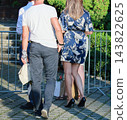 Woman Wearing Blue Dress And Heels 143822625