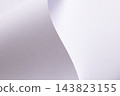 Curved paper texture, wave fold with bent edge and curl. Lavender gray sheet surface close up, matte diagonal shape on fine grain. Pastel designer paper backdrop, smooth gentle minimalistic 143823155