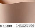 Beige paper texture, curved wave shape with bent edge fold. Tan sheet surface close up, soft matte curve and shadow on fine grain. Designer paper backdrop, earthy neutral tone, gentle 143823159