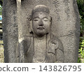 A stone Buddha (Jizo Bodhisattva) located within the grounds of Ryusoin Temple in Osaki, Shinagawa Ward. 143826795
