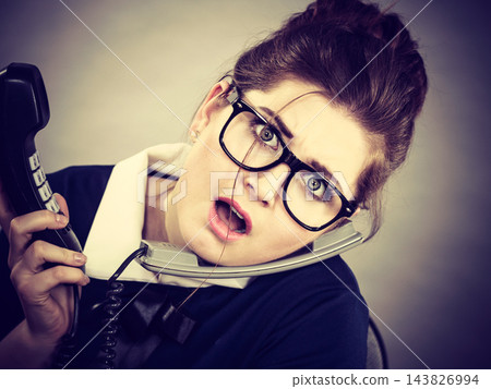 Sleepy business woman in office working 143826994