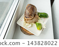 Big snail achatina pet. Animal at home. Eating cucumber veggies food 143828022
