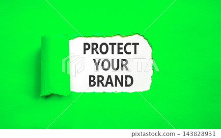 Protect your brand words symbol. Concept words Protect your brand on beautiful white paper. Beautiful green background. Business and protect your brand concept. Copy space. Protect your brand words symbol. Concept words Protect your brand on beautiful white paper. Beautiful green background. Business and protect your brand concept. Copy space. 143828931