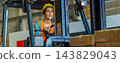 Woman worker at forklift driver happy working in industry factory logistic ship. 143829043