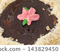 Chocolate Cake with Pink Cream Flower Decoration 143829450