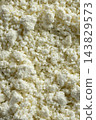Fresh organic cottage cheese texture background close up top view 143829573