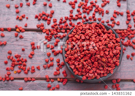 Seeds of achiote, originating from central america and parts of south america is used to season food Seeds of achiote, originating from central america and parts of south america is used to season food 143831162