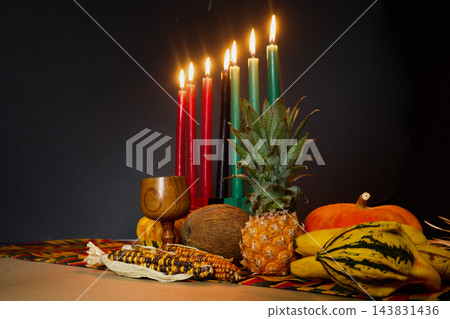 Kwanzaa kinara and harvest offerings celebrating african heritage 143831436