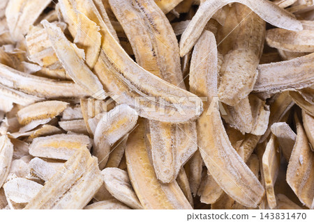 heap of dried green banana slices, top view heap of dried green banana slices, top view 143831470