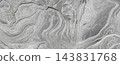 Gray slate with flowing geological bands and fractured stone texture 143831768