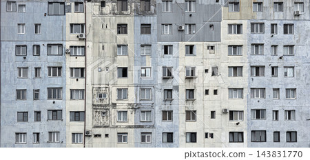 Urban apartment building facade with many windows Urban apartment building facade with many windows 143831770