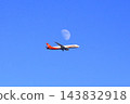 Moon and airliner 143832918