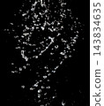 Shining water created sparkling splash with bright reflections and starburst flare, like  star in light. Water Glitter from splash caught light, creating abstract sparkling scene with star flare 143834635