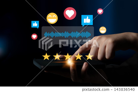 Hand Holding Smartphone with Social Media Icons, Emotions, Stars, and Feedback Concept on Dark Background for Digital Communication and Engagement Ledger Hand Holding Smartphone with Social Media Icons, Emotions, Stars, and Feedback Concept on Dark Background for Digital Communication and Engagement Ledger 143836540