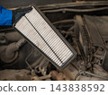 The mechanic will replace the engine air filter. 143838592
