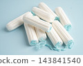 Cotton tampons for women hygiene menstrual period cycle protection. 143841540