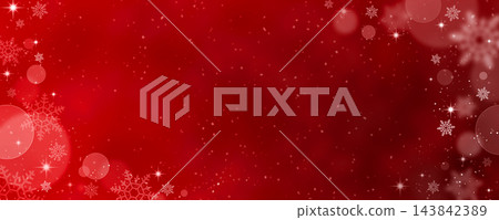 A Christmas red background with bokeh and snowflakes. A Christmas red background with bokeh and snowflakes. 143842389