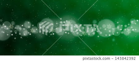 A Christmas green background with bokeh and snowflakes. A Christmas green background with bokeh and snowflakes. 143842392