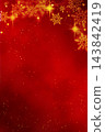 A Christmas red background with bokeh and snowflakes. 143842419