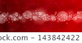 A Christmas red background with bokeh and snowflakes. 143842422