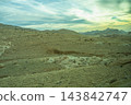 Desert landscape along the road to Shobak Castle in Jordan 143842747
