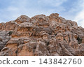 Sandstone cliffs in Little Petra, Jordan 143842760