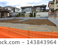 A large house was demolished and the resulting vacant lot was divided into two sections. 143843964