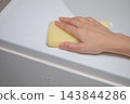 Imagine cleaning the bathtub with a sponge. 143844286