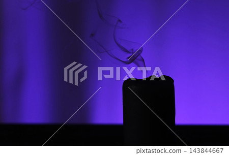 Smoke Rising From Blown-Out Candle 143844667