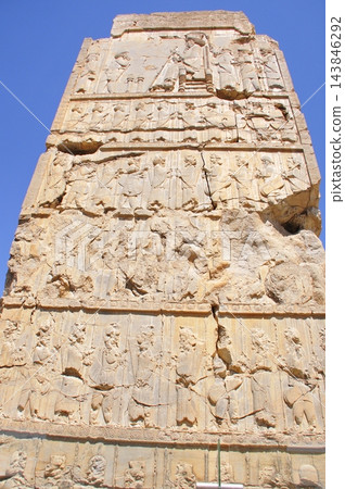 Persepolis, near Shiraz, Iran, the capital of the Achaemenid Persian Empire, relief of a king on a throne. Persepolis, near Shiraz, Iran, the capital of the Achaemenid Persian Empire, relief of a king on a throne. 143846292