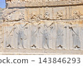 Persepolis, near Shiraz, Iran, the capital of the Achaemenid Persian Empire, relief of a king on a throne. 143846293