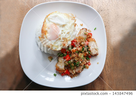 stir fried pork or deep fried pork , fried pork and rice or pork and rice stir fried pork or deep fried pork , fried pork and rice or pork and rice 143847496