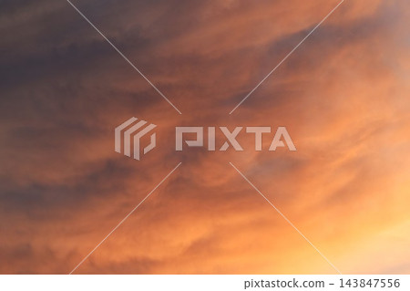 cloud spreading on orange twight sky in evening cloud spreading on orange twight sky in evening 143847556