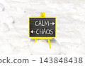 Calm instead chaos words symbol. Concept words Calm Chaos on beautiful yellow blackboard. Beautiful white snow background. Business medical psychology calm chaos concept. Copy space. 143848438