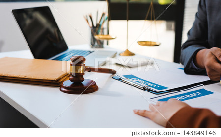 Businessmen or lawyers working together at a meeting, teamwork and partnership. Signing documents, contracts, checking details business agreement Businessmen or lawyers working together at a meeting, teamwork and partnership. Signing documents, contracts, checking details business agreement 143849146