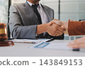 Businessmen or lawyers working together at a meeting, teamwork and partnership. Signing documents, contracts, checking details business agreement 143849153