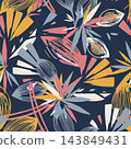 Decorative seamless pattern with stylized tropical leaves and petals in coral, mustard, cream, and blue on dark navy background, creating bold modern botanical wallpaper with playful retro feel. 143849431