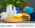 Soaps and Dispensers bottles. Natural eco set of shower gel and lotions and a washcloth 143850354