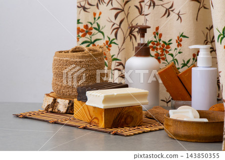 Soap and Dispensers bottles. Natural eco set of shower gels and lotions and a washcloth Soap and Dispensers bottles. Natural eco set of shower gels and lotions and a washcloth 143850355