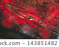 Water droplets on glass with intense red neon lighting reflection. Macro photograph of clear water drops condensed on glass surface with a dramatic deep red and dark neon glow background texture 143851482
