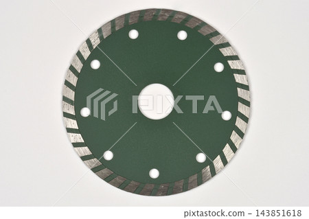 Green turbo diamond cutting blade isolated on white background 143851618