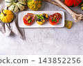 Halloween spooky snack bruschetta with skull 143852256