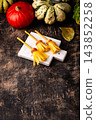 Halloween snack in shape of witch broomsticks 143852258