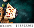 Spooky Halloween taco in shape of jack-o-lantern 143852263