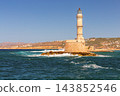 Historic Venetian Lighthouse Surrounded by Sea Waves in Chania Crete Greece 143852546