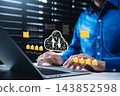 Cloud file backup and digital data storage management concept. Person using laptop with virtual folders, upload and download cloud icon, file transfer, database sync, document archive, secure workflow 143852598
