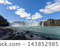 Godafoss cascades and turquoise river from a low rocky viewpoint in North Iceland 143852985
