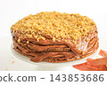 Homemade chocolate cake with nuts served on a plate close up 143853686